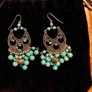 Beautiful dangling earring with silver metal and turquoise beads almost 3 inches